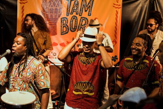 Mestre Junior "Pai de Santo" teaching percussion fundamentals