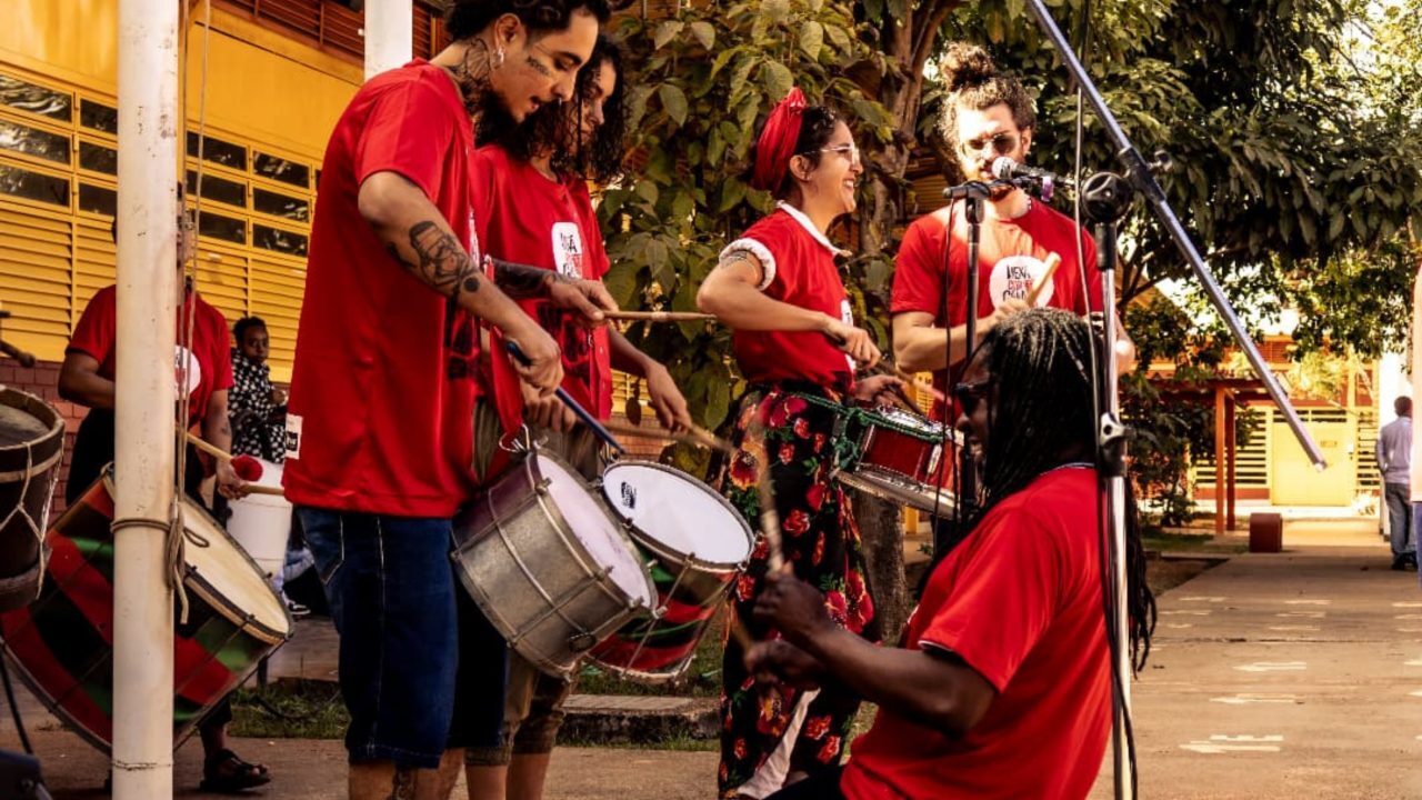Mestre Junior "Pai de Santo" leading a percussion workshop