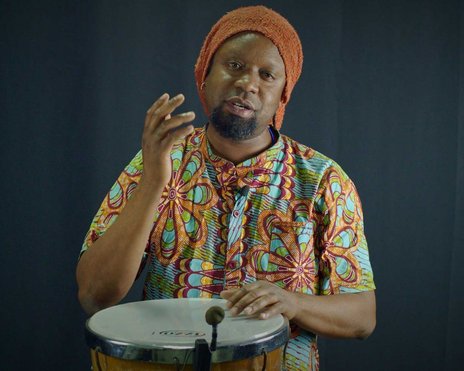 Mestre Adson Junior "Pai de Santo" teaching at the drum